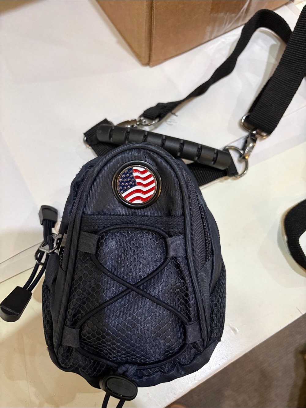 Black Crossbody Sling Bag with American Flag Badge